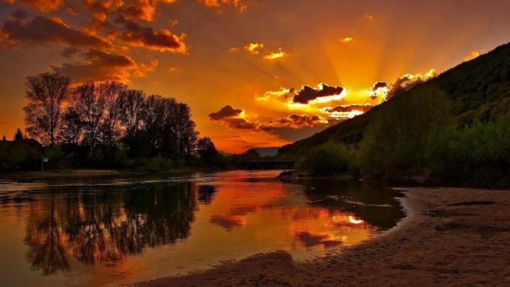 Sunset Sandy River Plazha.crveno Sky With Dark Cloud Reflection In 