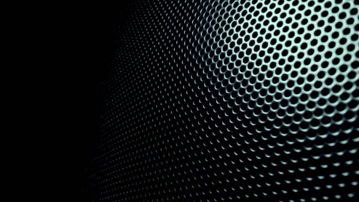 Dark Metal Background with Perforated Stock Footage Video (100% Royalty 
