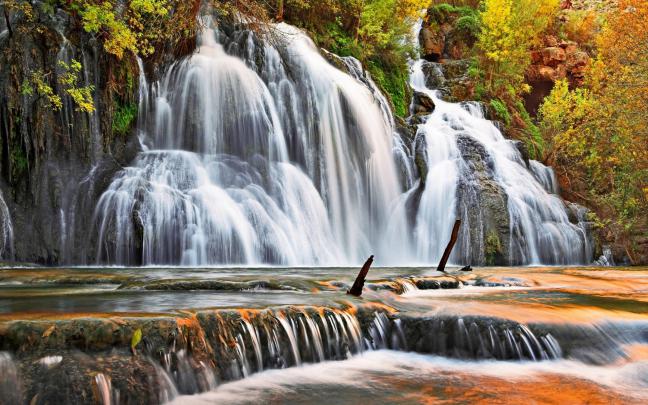 Autumn Waterfall-cascade-trees with yellow and red leaves-ultra-high 