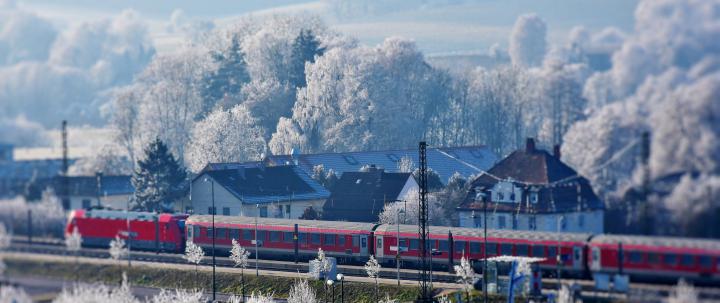 Download 2560x1080 wallpaper train, winter, snowfrost, houses, town 