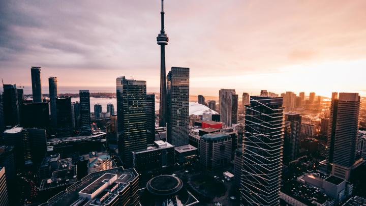 Download 1920x1080 wallpaper skycrappers, buildings, cityscape, sunset 